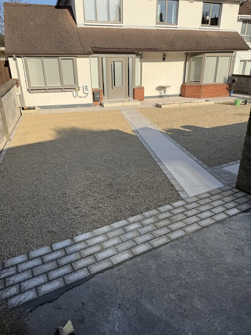 Finished gravel driveway with paved path